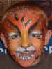 Tiger: All Face Painting, Body Painting, and Special Effects Images on this site are Copyright@Cool Faces.